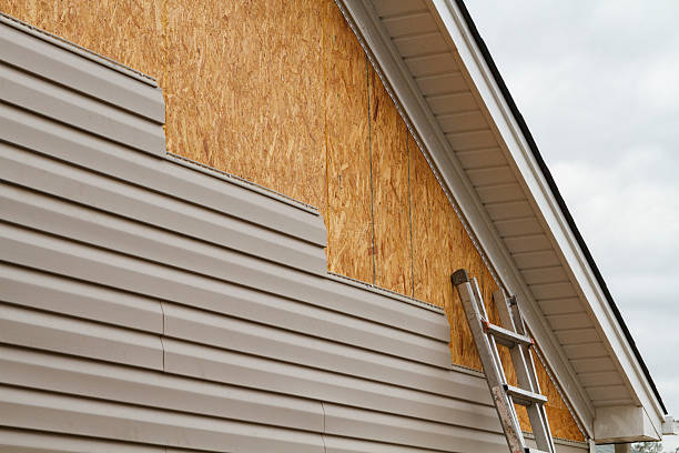 Professional Siding Replacement technician working in Charlestown, MA
